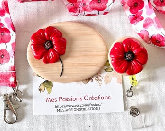 Insignia + carrete para enfermera, cuidadora, etc.... Tema flor de amapola ***