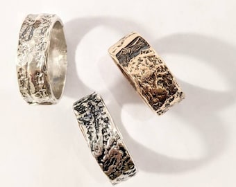 Wide band ring in sterling silver, burnished silver or bronze with irregular texture, custom made and made in Italy, a unisex jewel