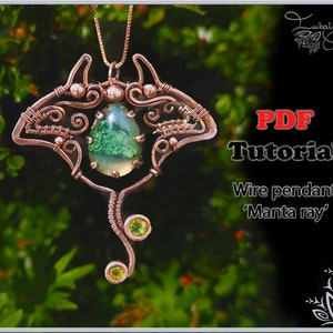 May include: A copper wire pendant shaped like a manta ray with a green agate stone in the centre and two smaller green stones on the tail. The pendant is hanging from a chain and is in front of a green leafy background. The text "PDF Tutorial Wire pendant 'Manta ray'" is in the bottom right corner of the image.