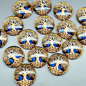 May include: A collection of circular glass cabochons featuring a detailed illustration of a tree of life with golden branches and roots against a vibrant blue background. Each piece has a smooth, domed surface with a glossy finish and intricate details.