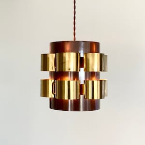 1960’s Werner Schou Coronell Electro pendant ceiling lamp in brown and brass. Made in Denmark.