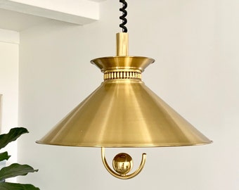 Vintage Danish brass alloy "rise and fall" ceiling pendant lamp / hanging light. Scandinavian design.