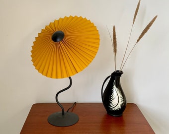 Clip on shade: Tilting Eclipse, pleated lampshade in ochre linen, with choice of finial colour. For table lamps, floor lamps or wall lights.