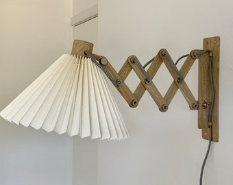 Scissor lamp in wood printed metal with choice of linen or chintz pleated, lower lampshade. Heavy and sturdy!
