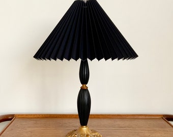 Vintage brass and black lacquered wood table lamp, with knife pleated, black chintz lampshade. Danish lighting.