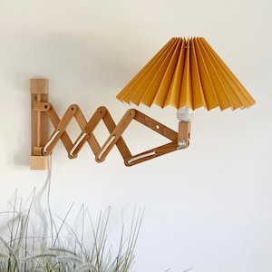 Danish designed beech wood accordion wall lamp with a new, Lekrazyhorse, pleated upper lampshade. Scandinavian retro interiors Ochre linen mix