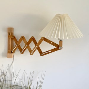 Danish designed beech wood accordion wall lamp with a new, Lekrazyhorse, pleated upper lampshade. Scandinavian retro interiors!