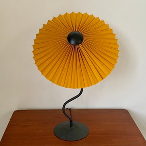 Clip on shade: Tilting Eclipse, pleated lampshade in ochre linen, with choice of finial colour. For table lamps, floor lamps or wall lights. image 3