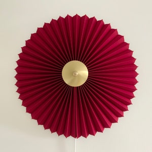 240V E14 Danish designed rosette wall light, choice of shade fabric and size/diameter. Solid brass centre finial. Cardinal red linen