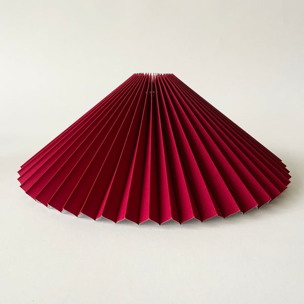 Clip on shade: Cardinal red linen, pleated lampshade, available in two styles, for table lamps/wall lights. Danish designed.