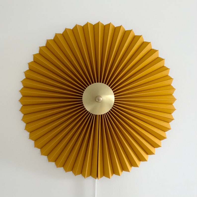 240V E14 Danish designed rosette wall light, choice of shade fabric and size/diameter. Solid brass centre finial. Ochre linen