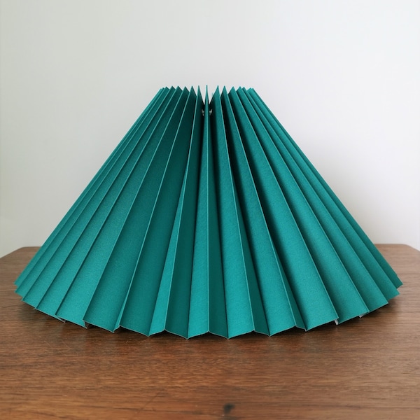 Clip on shade: Petrol cotton, pleated lampshade, available in two styles, for table lamps/wall lights. Danish design.
