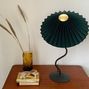 Clip on shade: Tilting Eclipse pleated lampshade in jungle green, with choice of finial. For table lamps, floor lamps or wall lights. Gold