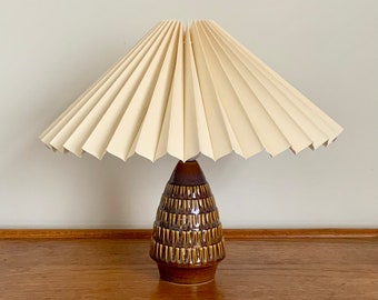Danish Soholm, mid-century glazed ceramic / pottery table lamp with a cream linen, knife pleated lampshade. Wired for USA / Canada