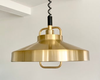 Danish brass lacquered "rise and fall" pendant lamp / hanging light by Super Light, Denmark, type 296. Made in Denmark.