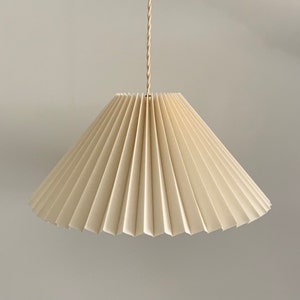 Hanging shade: Cream linen MEDIUM EASTERN style pleated pendant / hanging shade, available in several sizes. Danish design. image 1