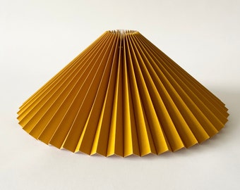 Clip on shade: Ochre yellow linen, pleated lampshade, available in two styles, for table lamps/wall lights. Danish designed.