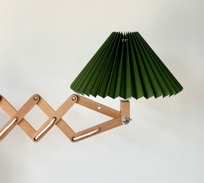 Danish designed beech wood accordion wall lamp with a new, Lekrazyhorse, pleated upper lampshade. Scandinavian retro interiors Basil green cotton