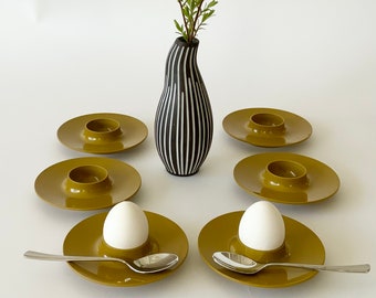 Set of 6 Rosti mepal egg cups. Dark curry yellow model Copenhagen U.115. Made in Denmark