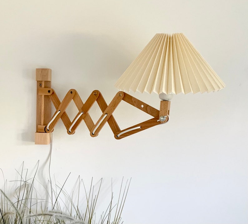 Danish designed beech wood accordion wall lamp with a new, Lekrazyhorse, pleated upper lampshade. Scandinavian retro interiors Cream linen