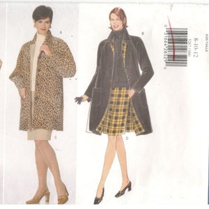 May include: A vintage Butterick sewing pattern featuring three different coat and skirt designs. One coat is solid tan, another is leopard print, and the third is a long black coat. The pattern number is 5267, and the size range is 8-10-12.