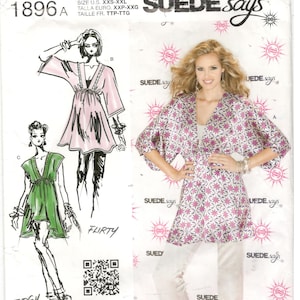 May include: A sewing pattern for a women's top with a V-neckline and a tie at the waist. The pattern is called "Suede Says" and is available in sizes XXS-XXL. The pattern is from Simplicity and has a barcode on the bottom.