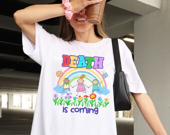 May include: White t-shirt with a rainbow and the words "DEATH is coming" in colorful letters. Three stick figures are holding hands under the rainbow.
