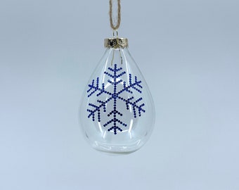 Teardrop glass Christmas ornament. Handmade blue rhinestone snowflake design.