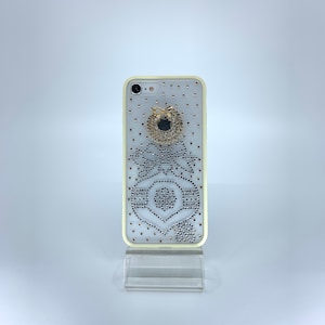 iPhone 7 or 8 TPU PC case. Unique Handmade. Silver rhinestone ornament bow design. Christmas wreath charm. White border Transparent Durable image 1