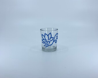 Votive candle holder, unique, handmade. 2.5 inches high. Blue flower, swirls rhinestone design.