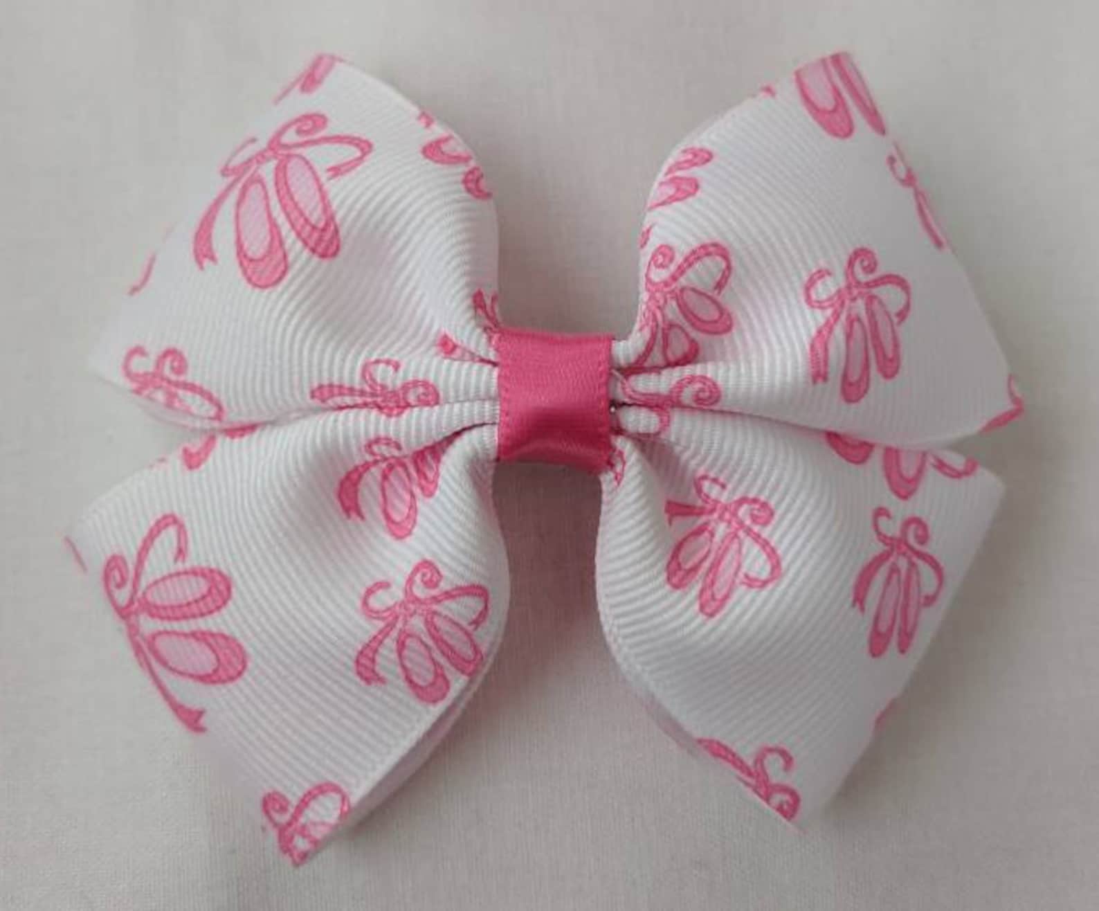 ballet shoes on white hairbow