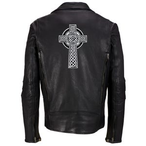 May include: Black leather jacket with a white Celtic cross design on the back.