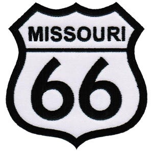 May include: White and black embroidered patch with the text "MISSOURI" and the number "66" in a shield shape.
