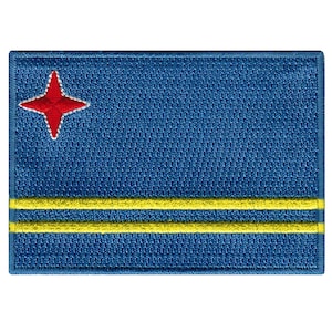 May include: A blue fabric patch with a red star and two yellow stripes. The patch is a representation of the flag of Aruba.