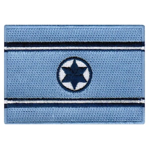 May include: A blue and white embroidered patch with a six-pointed star in a circle.