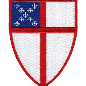 May include: A white shield with a red cross and a blue banner with white fleurs-de-lis. The shield is embroidered with a white outline.