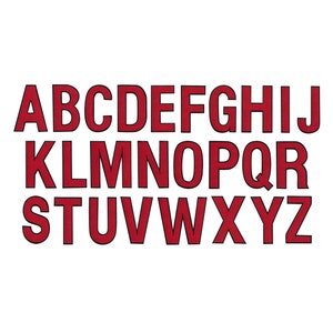 Peut inclure: Lettres de l'alphabet en feutre rouge en majuscules. Les lettres sont soulignées de noir et sont disposées sur trois rangées.