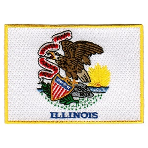 May include: An embroidered patch featuring the state seal of Illinois. The seal depicts a bald eagle holding a shield with 13 stars, a sunrise, and the words "State Sovereignty, National Union". The words "Illinois" are printed below the seal.