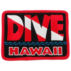 May include: Red, white, and blue embroidered patch with the word "DIVE" and the text "HAWAII" below. The "DIVE" text is stylized with a scuba diving flag.