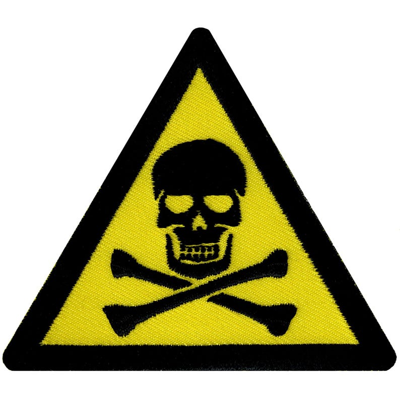 May include: A yellow triangle warning sign with a black skull and crossbones.