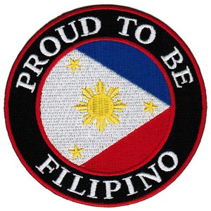 May include: A round black and white embroidered patch with the text "Proud to be Filipino" surrounding a depiction of the Philippine flag.