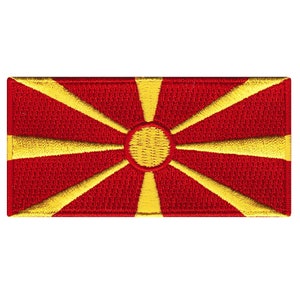 May include: A red embroidered patch with a yellow sun and eight rays. The patch is a representation of the flag of North Macedonia.