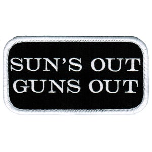 May include: Black and white embroidered patch with the text "SUN'S OUT GUNS OUT" in white lettering.