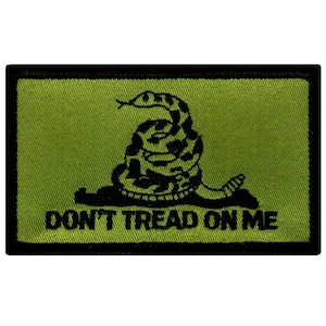 May include: A green and black embroidered patch with a coiled rattlesnake and the text "DON'T TREAD ON ME".