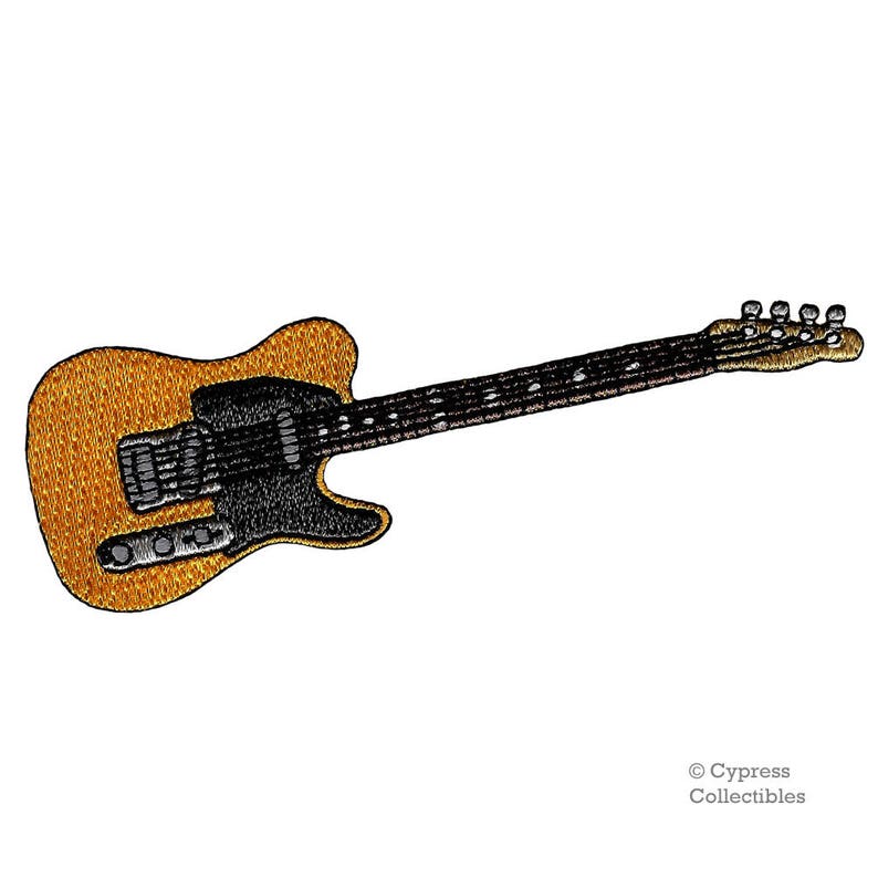Op de afbeelding: Een bruine en zwarte elektrische gitaar met een enkele cutaway. De gitaar heeft een lichtbruin lichaam en een zwarte pickguard. De gitaar is een Telecaster-stijl gitaar.