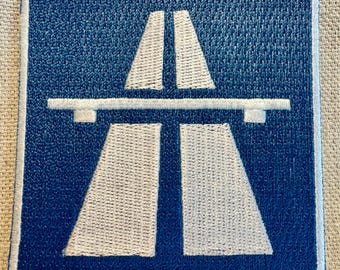 Parche termoadhesivo bordado con la señal de la autopista AUTOBAHN (Alemania).