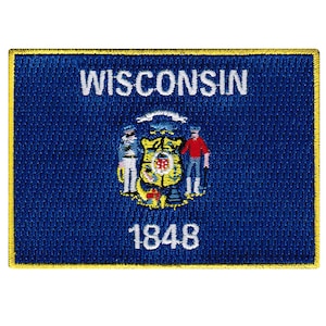 Op de afbeelding: Een geborduurde patch met het staatszegel van Wisconsin. Het zegel toont een schild met een das, een boer en een zeeman. De tekst "WISCONSIN" en "1848" zijn ook geborduurd op de patch.