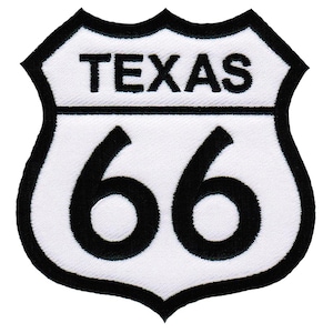 Puede incluir: Señal de carretera blanca y negra de la Ruta 66 con la palabra "TEXAS" en la parte superior.