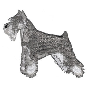 May include: A gray and white embroidered patch of a miniature schnauzer dog.