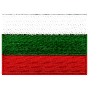 May include: A woven fabric patch with the Bulgarian flag. The flag has three horizontal stripes: white, green, and red.